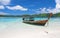 Longtail boat in beautiful lagoon near beach with