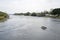 Longtail boat, traditional wooden boat, travels on River Kwai