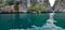 Longtail boats at Maya Beach with turquoise water and limestone rocks