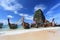 Longtail boats at the tropical beach of Poda island