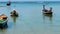 Longtail fisher boats on beach