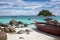 Longtails on Sunrise beach, island Lipe, Thailand.