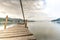 Longtime exposure at wooden jetty close to a pier