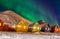 Longyearbyen colorful houses with Aurora Borealis in the sky full of stars