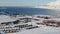 Longyearbyen, Svalbard. View of the Bay and town from the mountains. March.