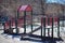 A lonley playground/jungle-gym on a sunny winter`s day in Harlem, New York, NY, USA