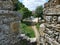 Look through the arched toll bridge le Cul du Moulin at the Loir