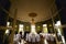 A look from behind the glass doors on a restaurant hall with round tables