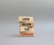 Look below the surface symbol. Concept word Look below the surface on wooden blocks. Beautiful grey background. Business and Look