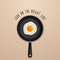 Look on the bright side - background with quote and fried egg on a black pan illustration.