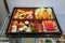 A look through cabinet mirror of Japanese bento food model