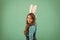 For look of future. Beauty look of Easter bunny. Little girl wear rabbit ears and long hair. Beauty and look. Hair salon