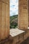 Look at largentiere through the pillars of the neoclassical courthouse