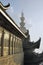 Look at puxian buddha through the temple eave