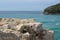 A look at the sea from the mountain. Stone in the foreground. The sea is unfocused. Adriatic