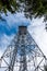 Look to transmitter telecommunication tower from the ground. GSM and television signal, touristic lookout tower.