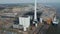 Look up aerial view over the city of Esbjerg power station. Birds eye revealing the chimney of the coal and oil fueled