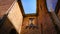 A Look At The Walls, Entrance And Roof Of An Ancient Brick Christian Church In Bruges, Belgium