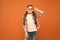 Look well and feel beautiful. Adorable girl with fashionable look on orange background. Little child having geeky look