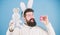 Look what i found. Hipster cute bunny blue background. Easter bunny. My precious. Funny bunny with beard and mustache