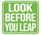LOOK BEFORE YOU LEAP, text written on green stamp sign