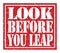 LOOK BEFORE YOU LEAP, text written on red stamp sign
