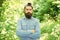 Look your best. hispter style. Fashion portrait of man. Hair beard care. guy in forest. summer camping. serious bearded