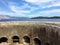 Looking above the walls of the old fortress of Korcula town outwards to the adriatic sea and peljesac peninsula