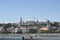 Looking across the Danube River to Castle Hill, Budapest, Hungary, you see 3 churches, Capuchin, Mathias, and St Anne.