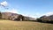 Looking across field down Borrowdale valley