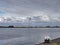 Looking across a part of the North Sea Canal towards the large Liquid Storage Tanks and Wind Turbines in Den Haag.