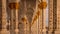 Looking along the white, floral decorated, marble columns