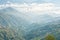 Looking at amazing view of clouds on the Himalayas and rice terraces in Nagarkot in Nepal.