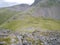 Looking down on Beckhead Tarn from rocks on Rib End, Kirk Fell