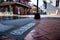 Looking Down Bourbon Street From Tiles in Sidewalk