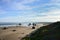 Looking Down At Coquille Point Beach At low Tide, With The View South Jetty Of The Coquille River In the Distance