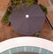 Looking Down Onto Round Balcony And Umbrella