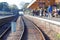 Looking down the railway tracks in a station.