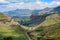 Looking down on a road winding through the valley in Golden Gate Highlands National Park