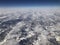 Looking down from the sky, the Earth covered with snow and white are stacked