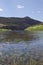 Looking down the slow flowing green river from the canyon