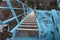 Looking Down Stairs from Top of Abandoned Blue Roller Coaster