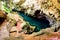 Looking down at a Subterranean lake inside a cave