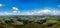Looking down from the top of the volcano called Mountt Tuahara onto rural farmland and agricultural fields near Lake Taupo