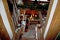 Looking down into a Tudor kitchen that is decorated for Christmas