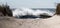 Looking through a footpath between sand dunes at Ocean Waves Crashing on the shore