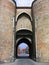 Looking through the Gentpoort, Gate of Ghent, Part of the Medieval City Fortifications of Bruges, Belgium