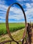 Looking Through Old Rusty Farm Equipment Wheels in Palouse Hills