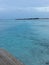 looking out at the beautiful little island from the deck of the water villa resort maldives