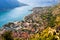 Looking over the Bay of Kotor in Montenegro with view of mountains, boats and old houses